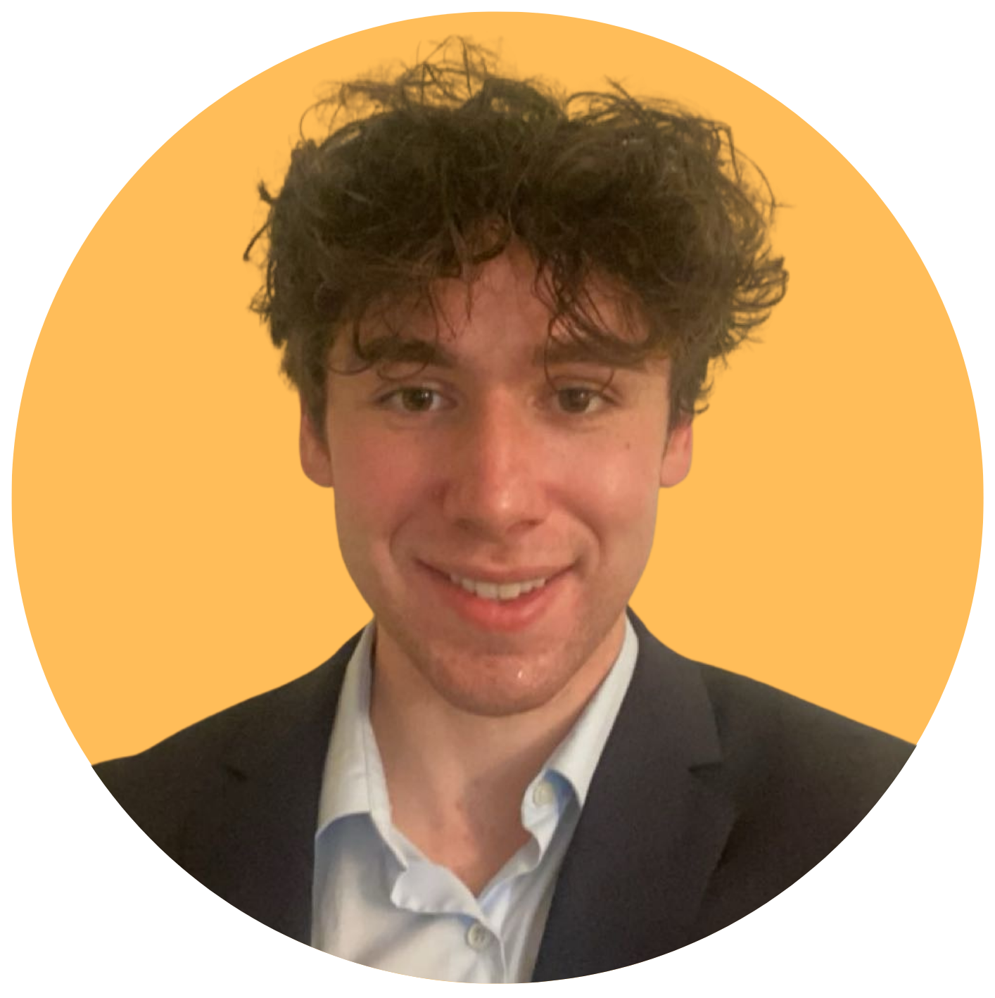 Headshot of Devin Wellowszky, smiling.