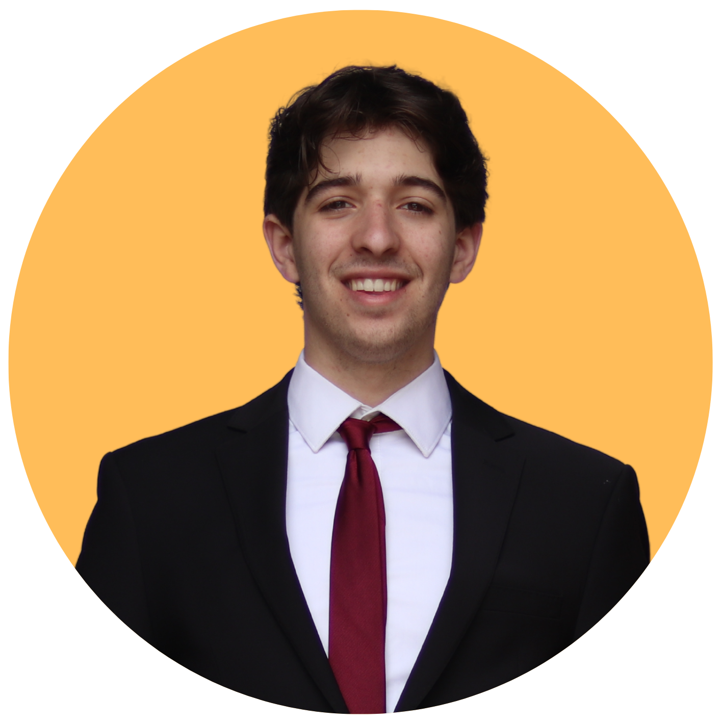 Headshot of Dominic Botelho, smiling.